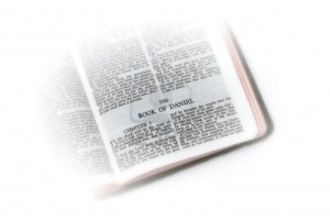 5214203-holy-bible-open-to-the-book-of-daniel-with-white-vignette-giving-the-image-a-clean-heavenly-feel